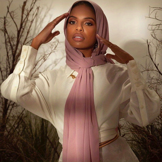 Model Embracing Elegant Drapes with Heavy Chiffon Hijab