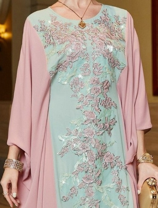 Detailed View of the Luxurious Sequin Embroidery on the Pink Caftan