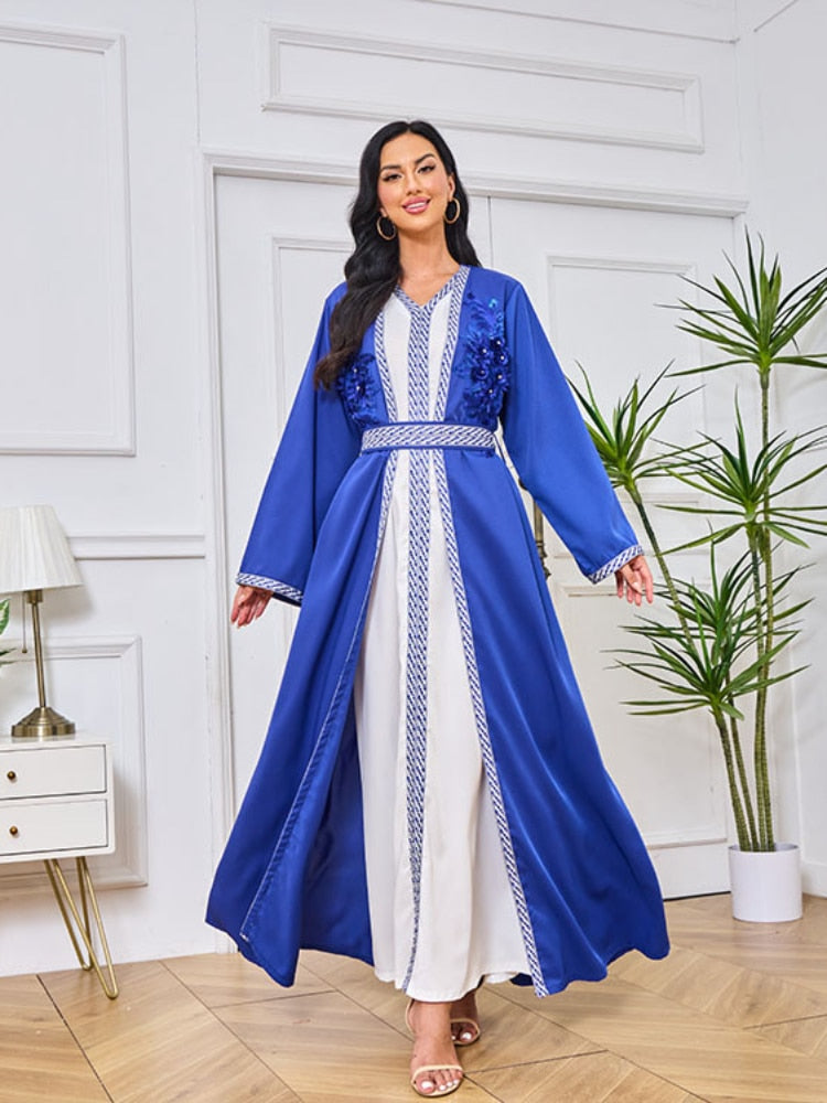 Model Radiating Elegance in the Open Abaya with Belt and Floral Embroidery