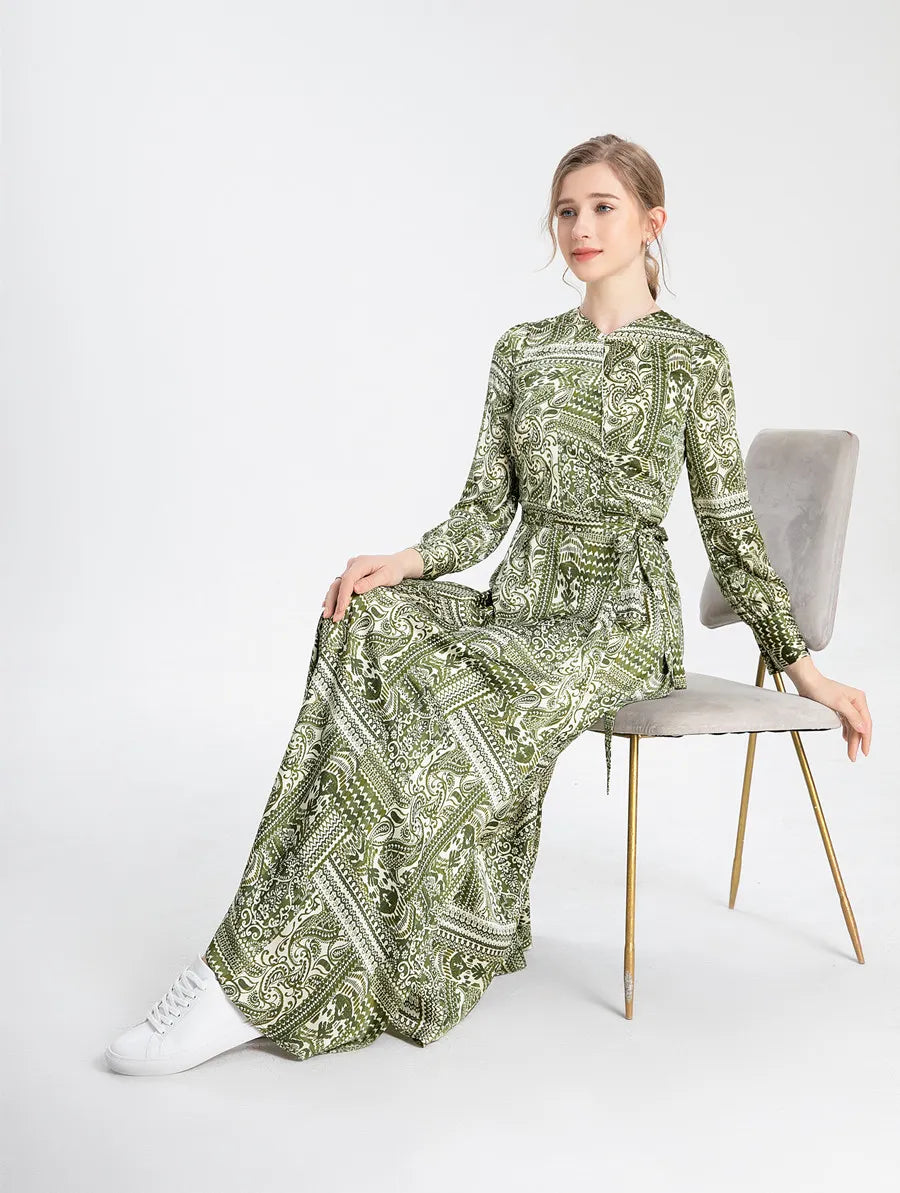 Vintage Green Maxi Dress with Sleeves showcasing abstract design.