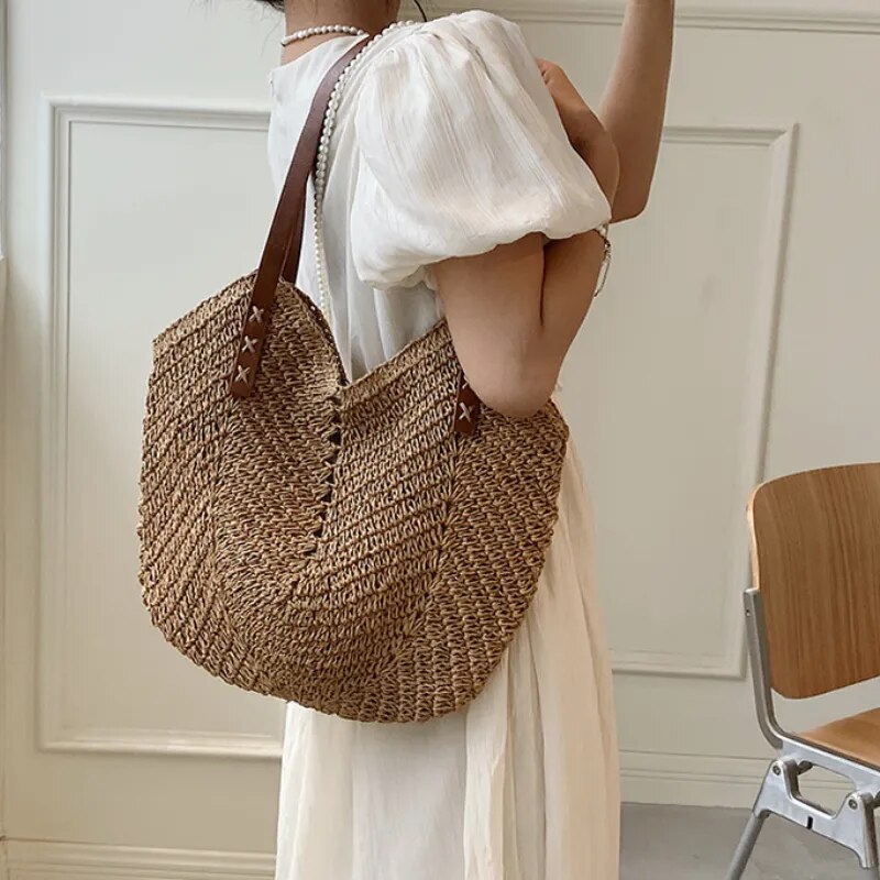 Model Embracing Boho Beauty with Woven Shoulder Hand Bag